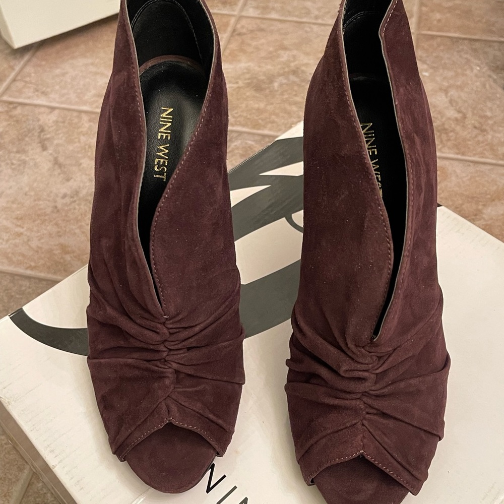 Cute Nine West 3.5” heeled peep-toed booties; open in front